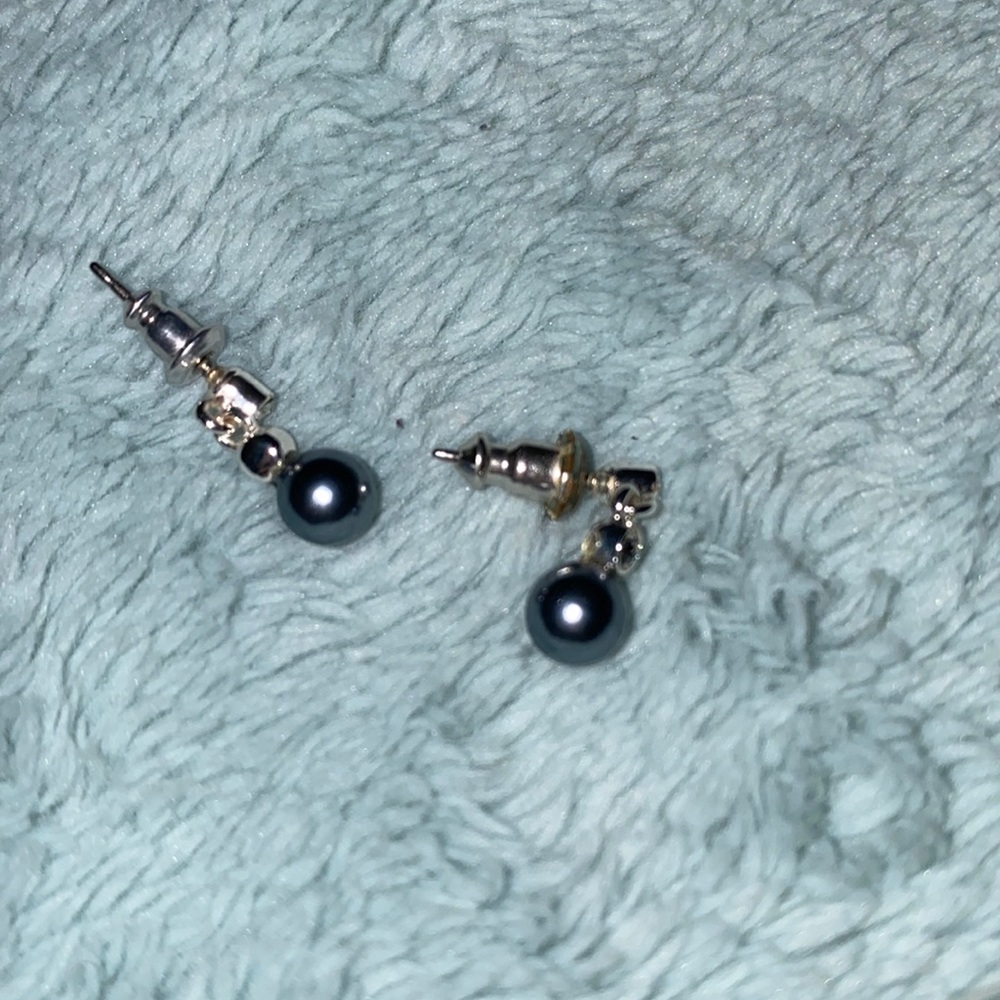 Blue pearl dangly earrings and white and blue stud earrings